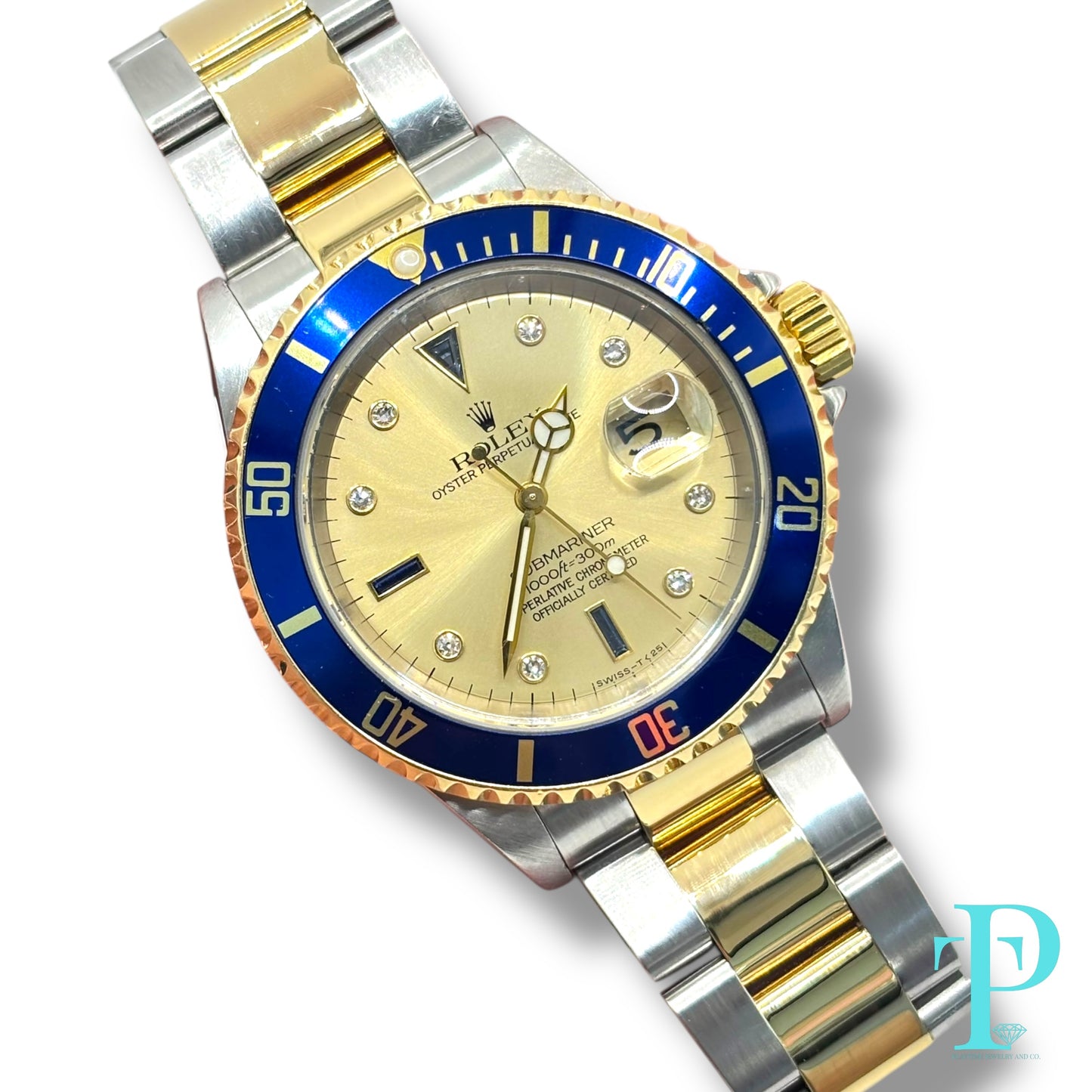 40MM ROLEX SUBMARINER (ANNIVERSARY “SERTI” DIAL) 18KT GOLD / STAINLESS STEEL TWO-TONE / OYSTER BRACELET / AUTOMATIC / DIAMOND AND SAPPHIRE SET HOUR MARKERS