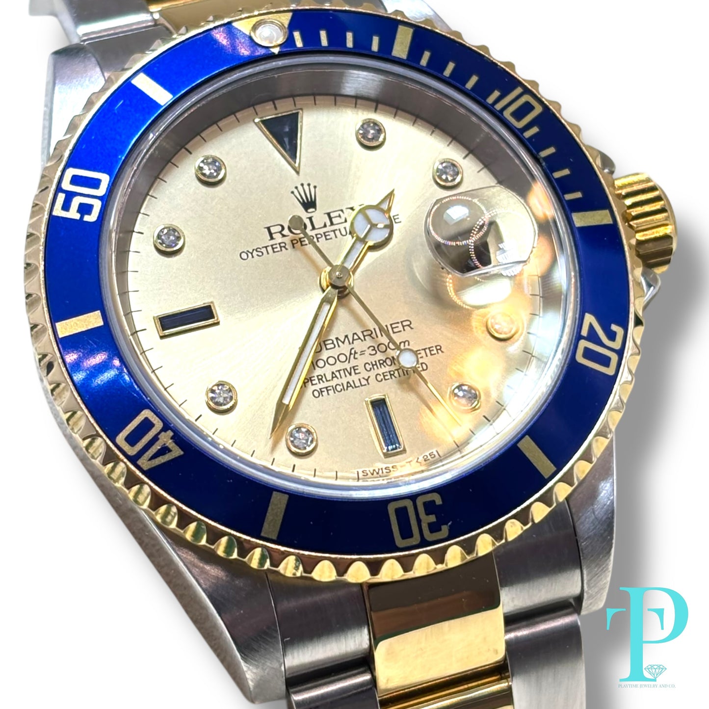 40MM ROLEX SUBMARINER (ANNIVERSARY “SERTI” DIAL) 18KT GOLD / STAINLESS STEEL TWO-TONE / OYSTER BRACELET / AUTOMATIC / DIAMOND AND SAPPHIRE SET HOUR MARKERS