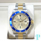 40MM ROLEX SUBMARINER (ANNIVERSARY “SERTI” DIAL) 18KT GOLD / STAINLESS STEEL TWO-TONE / OYSTER BRACELET / AUTOMATIC / DIAMOND AND SAPPHIRE SET HOUR MARKERS