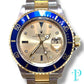 40MM ROLEX SUBMARINER (ANNIVERSARY “SERTI” DIAL) 18KT GOLD / STAINLESS STEEL TWO-TONE / OYSTER BRACELET / AUTOMATIC / DIAMOND AND SAPPHIRE SET HOUR MARKERS